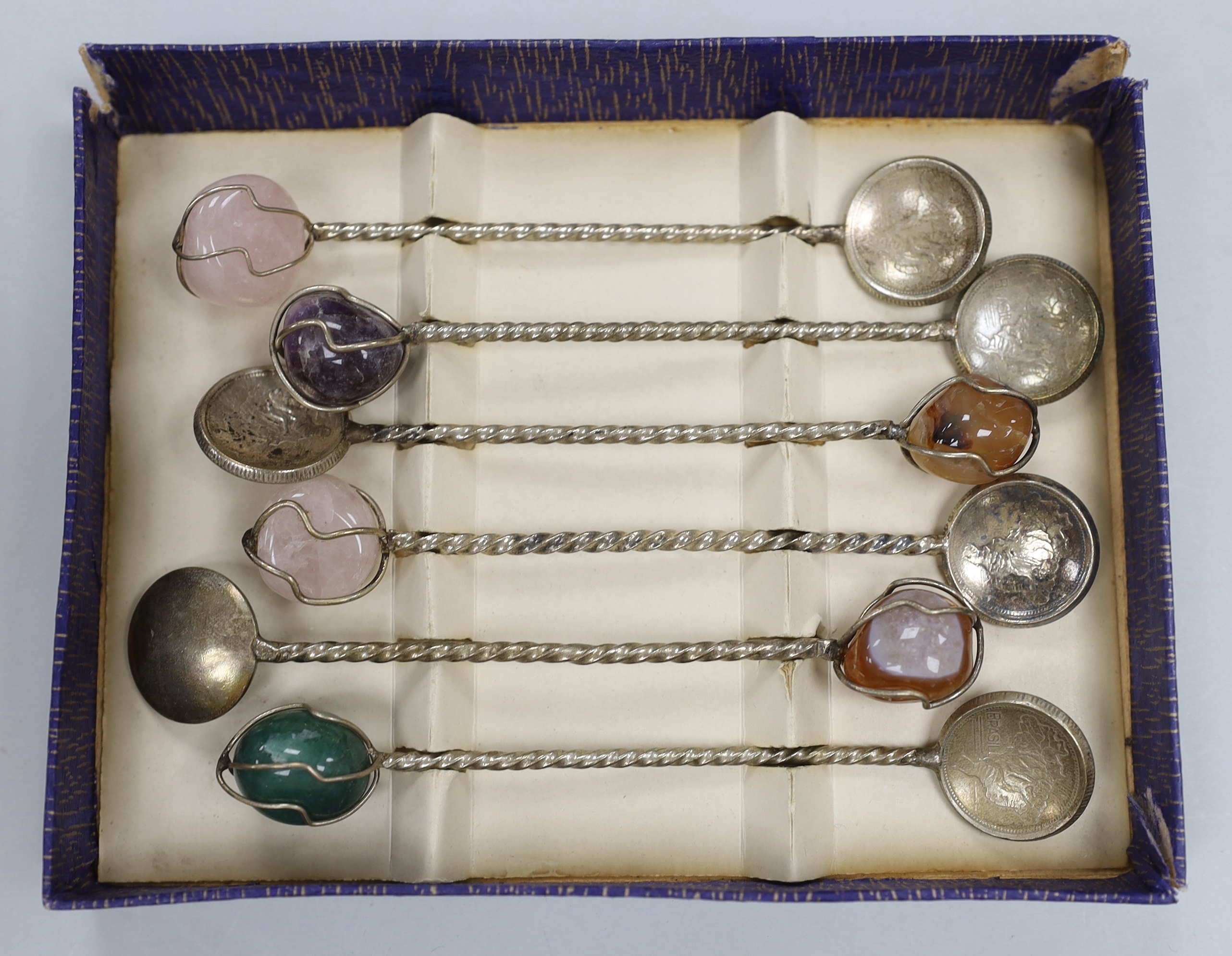 Six assorted cased sets of flatware including bean end coffee spoon, preserve spoons and spoon and pusher.